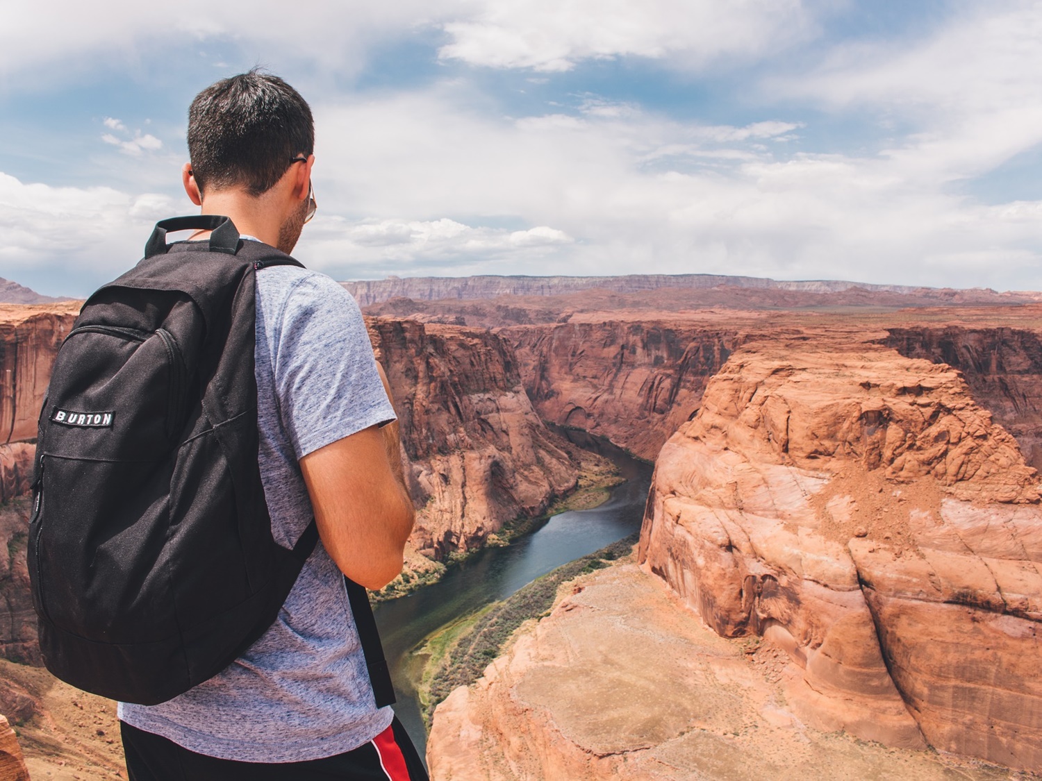 Man atop the Grand Canyon